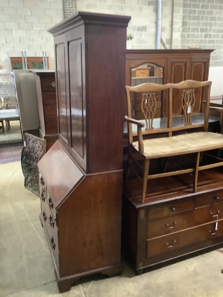 A George III mahogany bureau cabinet, width 114cm, depth 58cm, height 222cm